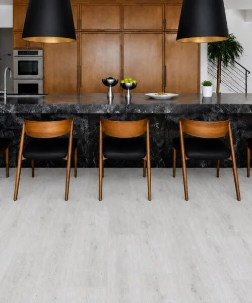 Como Oak White - 7/16" (11mm) - Swiss Design Cork Floating (FCOW11) White oak-look Swiss cork floating floor in a warm contemporary kitchen