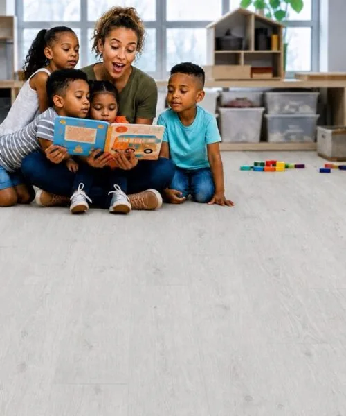 Como Oak White - 7/16" (11mm) - Swiss Design Cork Floating (FCOW11) Durable Swiss cork flooring in a colorful daycare playroom
