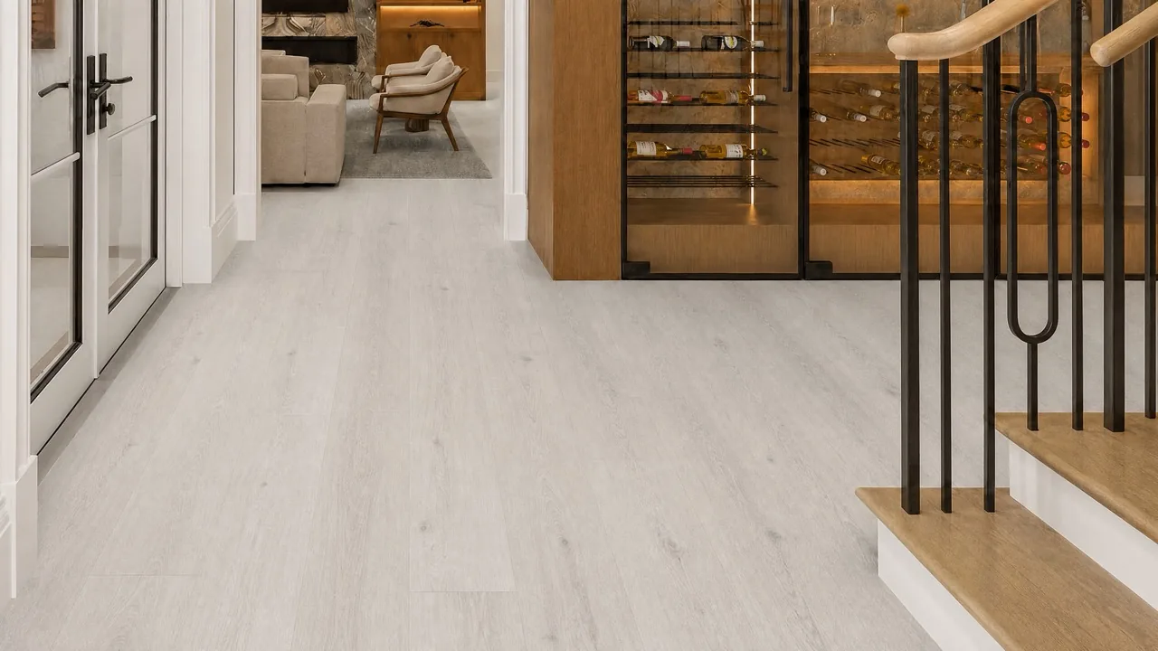 Como Oak White - 7/16" (11mm) - Swiss Design Cork Floating (FCOW11) Wide-plank Como White Oak cork floor in a hallway with wine storage