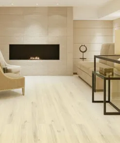 Elegant living room with Swiss Como White Oak Cork Floating Flooring, modern fireplace, and neutral decor showing natural light oak tones
