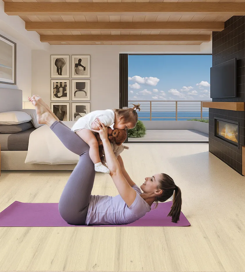 Como Oak White - 7/16" (11mm) - Swiss Design Cork Floating (FCOW11) Swiss Como White Oak Design Cork Flooring in a bright coastal bedroom, soft and warm underfoot, ideal for yoga and family activities.