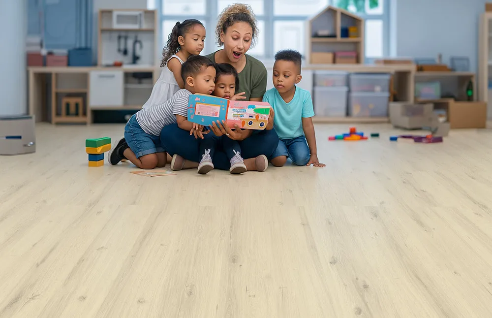 Como Oak White - 7/16" (11mm) - Swiss Design Cork Floating (FCOW11) wiss Como White Oak Design Cork Flooring in a children’s playroom—eco-friendly, comfortable, and safe for kids to play and learn on daycare