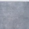 Concrete Alloy Swiss TechSlate flooring with a realistic gray concrete appearance, subtle cement texture, contemporary industrial style, and durable low-maintenance surface for residential and commercial interiors