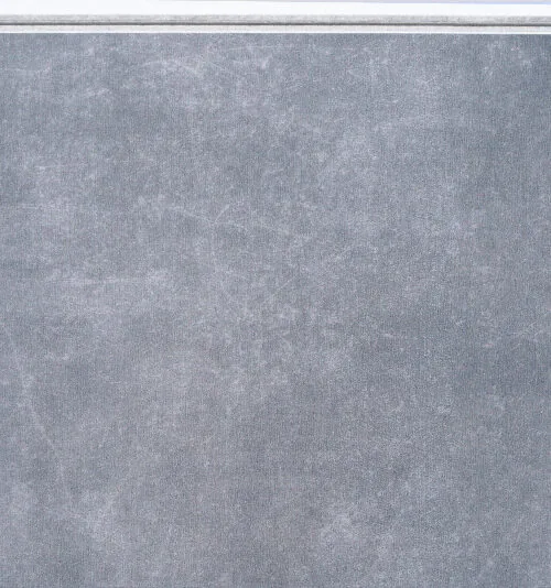Concrete Alloy Swiss TechSlate flooring with a realistic gray concrete appearance, subtle cement texture, contemporary industrial style, and durable low-maintenance surface for residential and commercial interiors