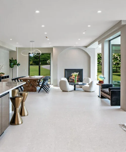 creme royal marble forna cork flooring living room with leather sofa