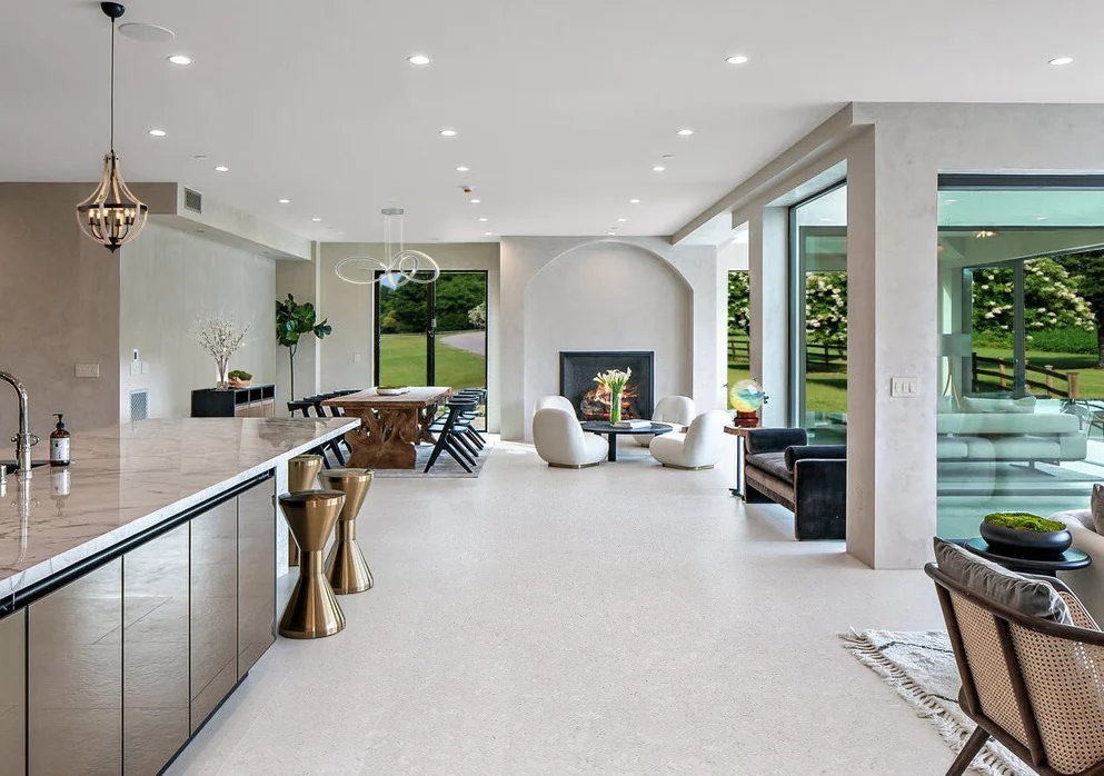 creme royal marble forna cork flooring living room with leather sofa
