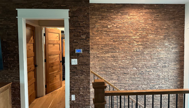 Google review photo from Damara Friederich showing Stacked Stone cork wall tile installed on a wall