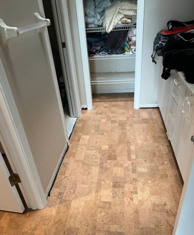 Google review photo from Dan Hiett showing Leather cork flooring installed in a hallway