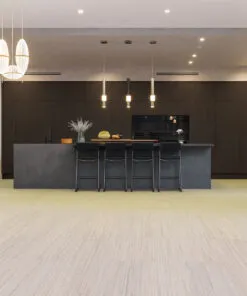 Vertical - 7/16" (11mm) - Swiss Real Cork Floating (FVtc11) Sophisticated kitchen with black cabinetry, pendant lighting, and Vertical Swiss cork flooring providing warmth, comfort, and a refined modern look.”