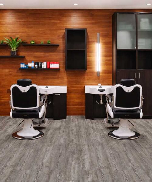 Earthy Pine - 3/8" (9.5mm) - Swiss Real Linoleum Hydrowood Core Waterproof Floating Flooring (NEthPin9.5) Professional salon space with Earthy Pine waterproof lino flooring, easy to maintain and ideal for commercial settings.