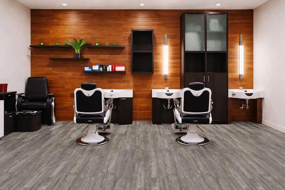 Earthy Pine - 3/8" (9.5mm) - Swiss Real Linoleum Hydrowood Core Waterproof Floating Flooring (NEthPin9.5) Professional salon space with Earthy Pine waterproof lino flooring, easy to maintain and ideal for commercial settings.