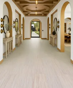 Vertical - 7/16" (11mm) - Swiss Real Cork Floating (FVtc11) Spacious entry hallway with arched openings, coffered ceiling, and Vertical Swiss cork flooring in soft neutral tones for timeless elegance and durability.