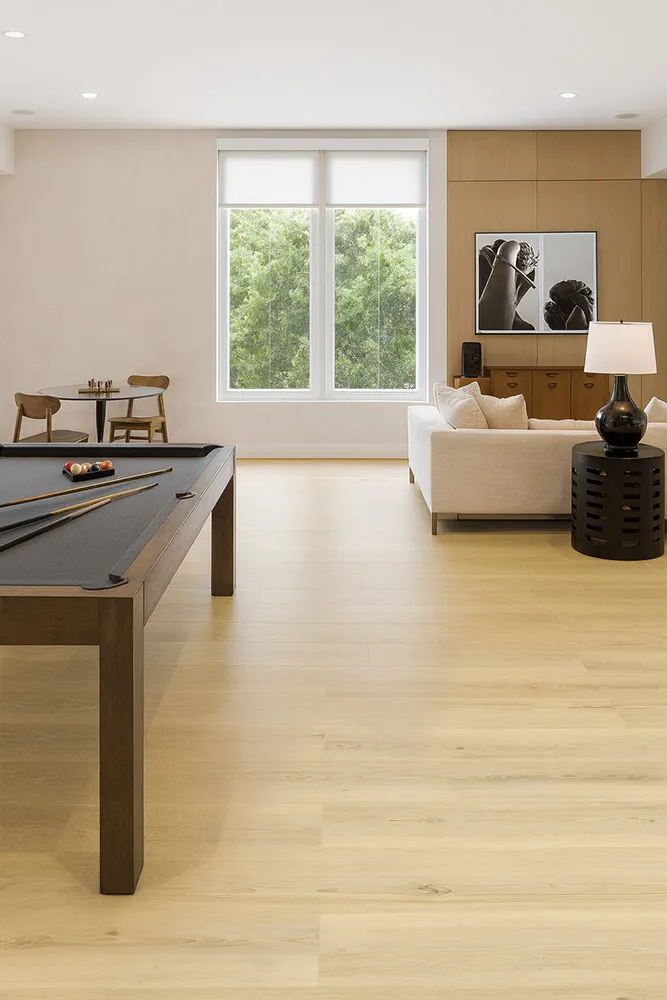 Pinewood 7/16_ (11mm) Swiss Design Cork Floating (FPinwo11) Spacious family room with Engadin Blonde Pinewood Swiss Design cork flooring offering a warm, inviting look and smooth natural texture.