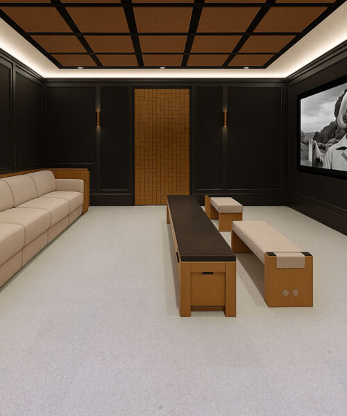 Cozy home theater with beige Grano cork flooring, soft lighting, and acoustic wall panels that create a warm and quiet entertainment space.