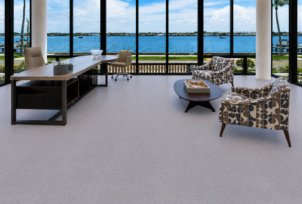Grano - 25/64" (10mm) - Cork Floating (FGra10) Grano sustainable cork flooring with a soft speckled surface fills a bright waterfront office and lounge.