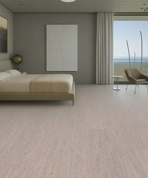 serene bedroom with ocean view and sustainable gray bamboo cork flooring