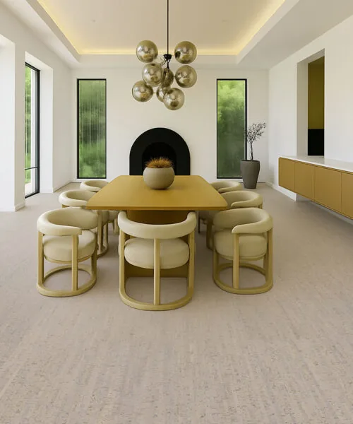dining room with golden chairs and wood table highlighted by gray bamboo cork flooring.