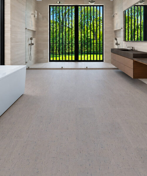 Gray Bamboo - 1/2" (12mm) - Cork Floating (FGB12) Gray Bamboo taupe cork floor planks cover a spacious bathroom with freestanding tub and floating wood vanity.