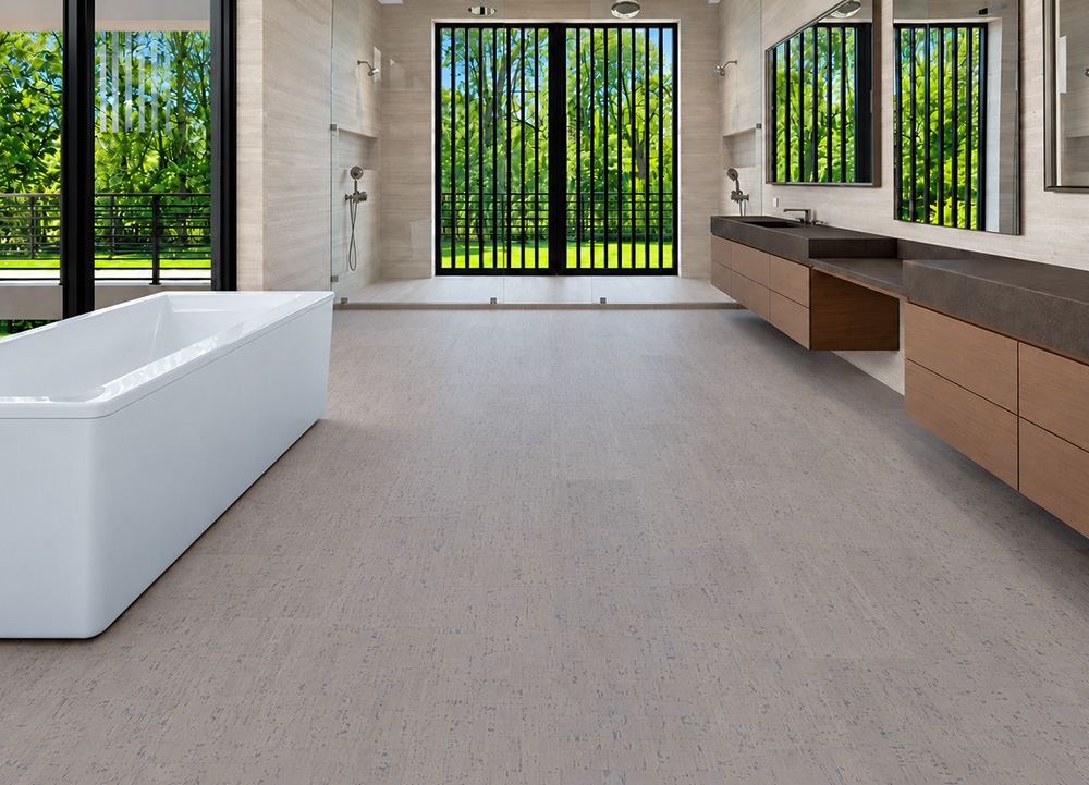 Gray Bamboo - 1/2" (12mm) - Cork Floating (FGB12) Gray Bamboo taupe cork floor planks cover a spacious bathroom with freestanding tub and floating wood vanity.