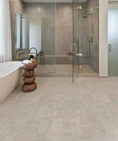Glue-down cork tile bathroom flooring detail view