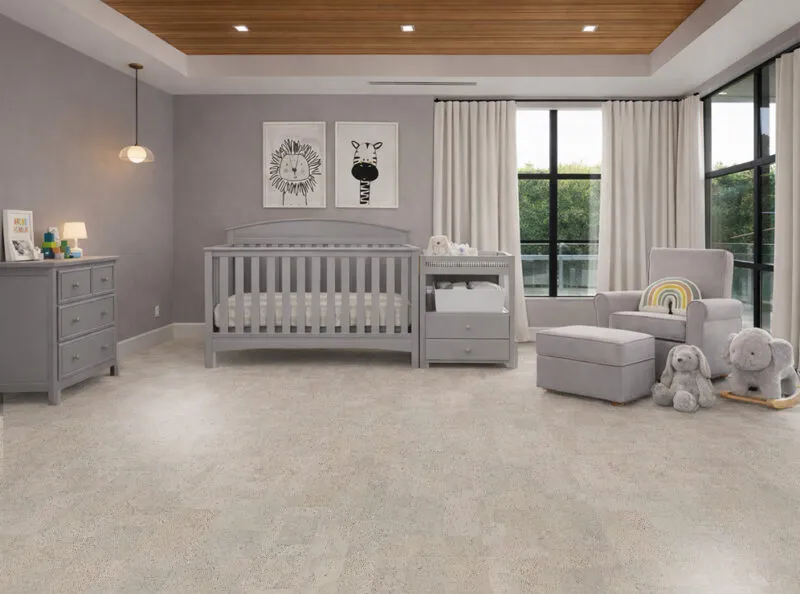 Gray leather Eco-friendly nursery with cork flooring that offers gentle cushioning and timeless style.
