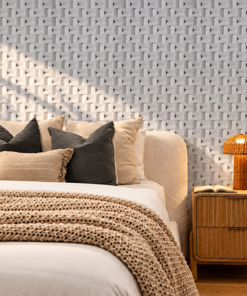 Greece White textured cork wall panels add geometric depth to a tall fireplace feature wall in a luxury contemporary living room.