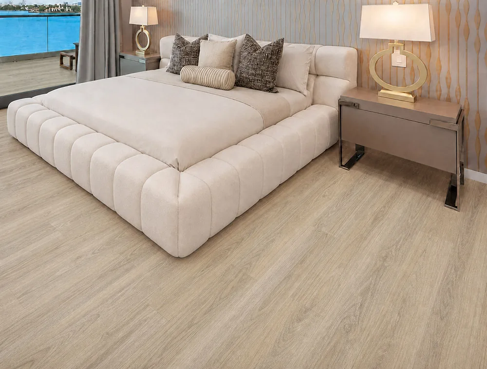 Hamilton - 7/16" (11mm) - Swiss Design Cork Floating (FHam11) Hamilton light beige cork floating flooring in a luxury bedroom with a cream upholstered bed
