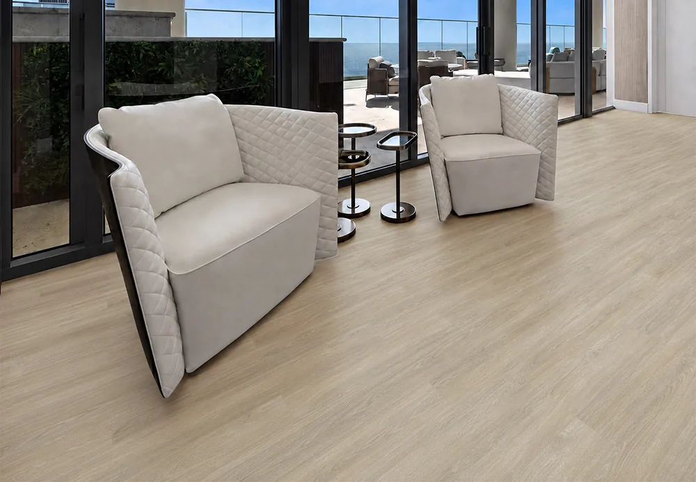 Hamilton - 7/16" (11mm) - Swiss Design Cork Floating (FHam11) Hamilton light beige wood-look cork flooring in a contemporary living room with white lounge chairs