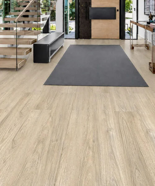 Hamilton - 7/16" (11mm) - Swiss Design Cork Floating (FHam11) Hamilton light gray cork floating flooring with an aged wood-grain pattern in a modern entryway