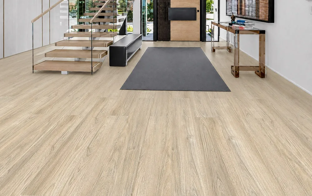 Hamilton - 7/16" (11mm) - Swiss Design Cork Floating (FHam11) Hamilton light gray cork floating flooring with an aged wood-grain pattern in a modern entryway