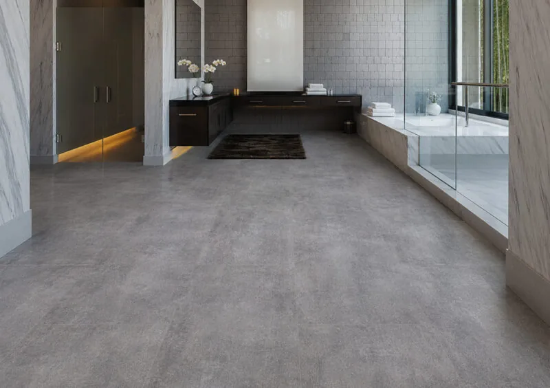Industrial Grey Forna Natural Composite Flooring in a modern bathroom with a concrete look surface