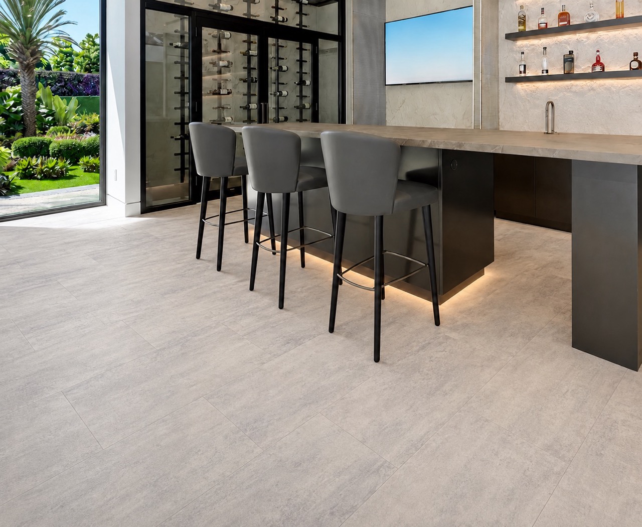 Ivory Concrete - 3/8" (9.5mm) - Forna Natural Composite Flooring with Waterproof Hydrowood Core (NICon9.5) Ivory Concrete waterproof Natural Composite Flooring features subtle gray variation beneath a contemporary bar and wine storage.