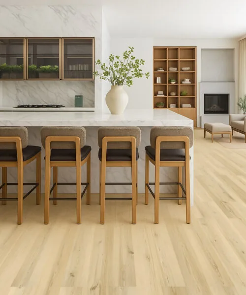 Pinewood 7/16_ (11mm) Swiss Design Cork Floating (FPinwo11) pen kitchen and dining area with Lucerne Glow Pinewood Swiss Design cork flooring in a natural blonde hue and modern interior style.