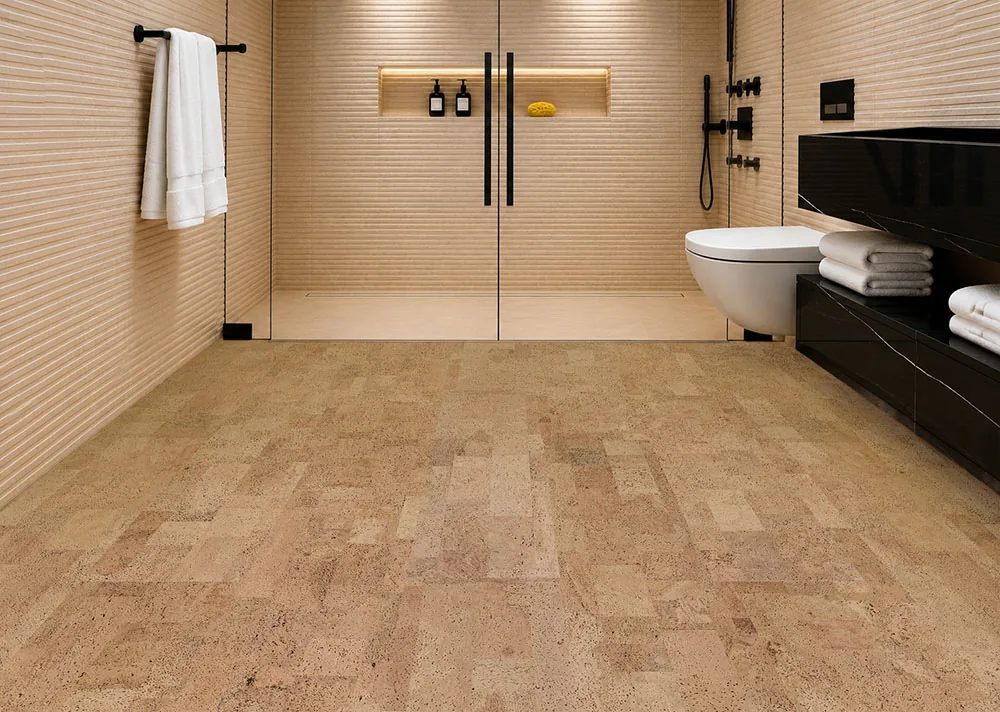 Leather - 1/4" (6mm) - Cork Glue Down Tile (GLe6) Spa-inspired bathroom featuring Leather Natural 6mm glue-down cork tile flooring, a walk-in glass shower, matte black fixtures, and a warm, comfortable natural cork floor sealed for bathroom use.