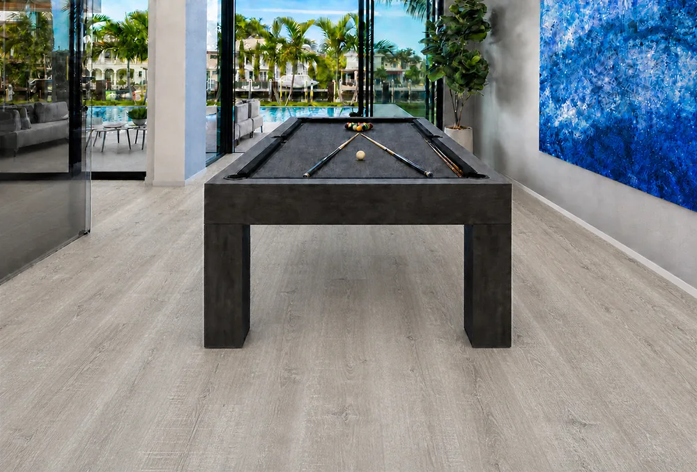 Light Grey Oak - 13/32" (10.5mm) - Design Cork Floating (FLG10.5) Modern billiards room featuring light grey oak-look cork flooring and poolside views