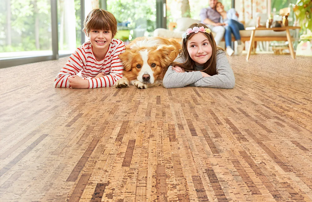 Linea Dark - 7/16" (11mm) - Swiss Real Cork Floating (FLin11) Children and pet relaxing on Linea Dark Swiss cork flooring, highlighting its warmth, softness, and family-friendly performance.