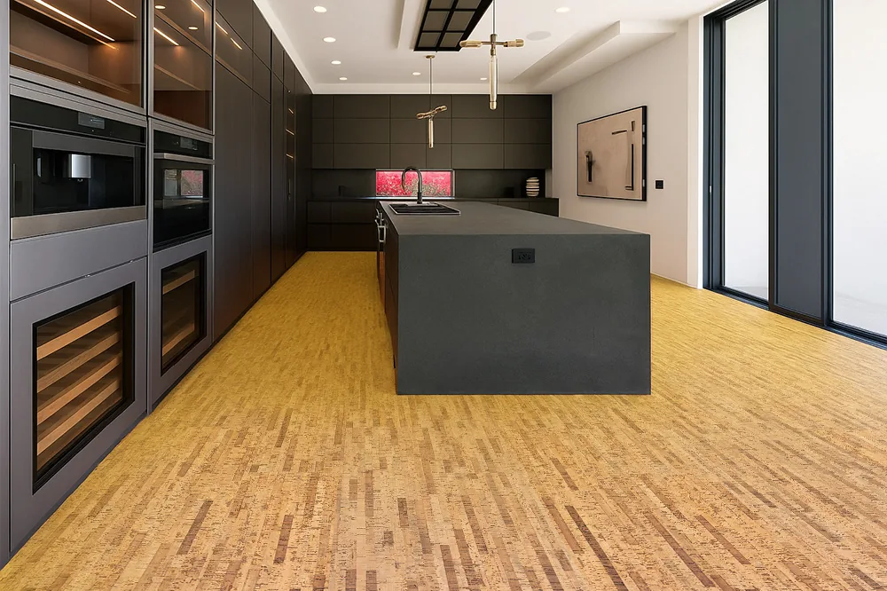 Linea Dark - 7/16" (11mm) - Swiss Real Cork Floating (FLin11) Open-concept kitchen designed with Linea Dark cork flooring, offering sustainable style and everyday durability.