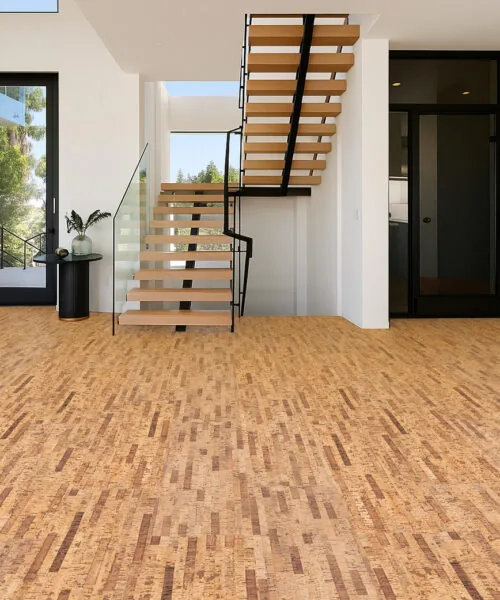 Linea Dark - 7/16" (11mm) - Swiss Real Cork Floating (FLin11) Contemporary entryway with floating staircase installed over Linea Dark Swiss cork flooring for a clean modern aesthetic.