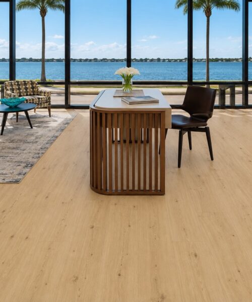 Long Beach - 7/16" (11mm) - Swiss Design Floating (FLB11) Natural light oak Long Beach Swiss Design cork flooring enhances a contemporary sitting area with designer chairs, dining space, and expansive glass doors.
