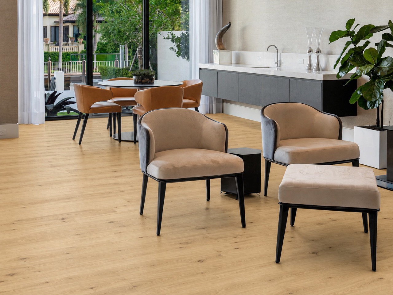 Long Beach - 7/16" (11mm) - Swiss Design Floating (FLB11) Wide-plank Long Beach Swiss Design cork flooring in a luxury waterfront office with floor-to-ceiling windows, designer desk, and natural daylight.