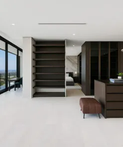 Master bedroom with dark furniture and elegant white leather cork flooring.