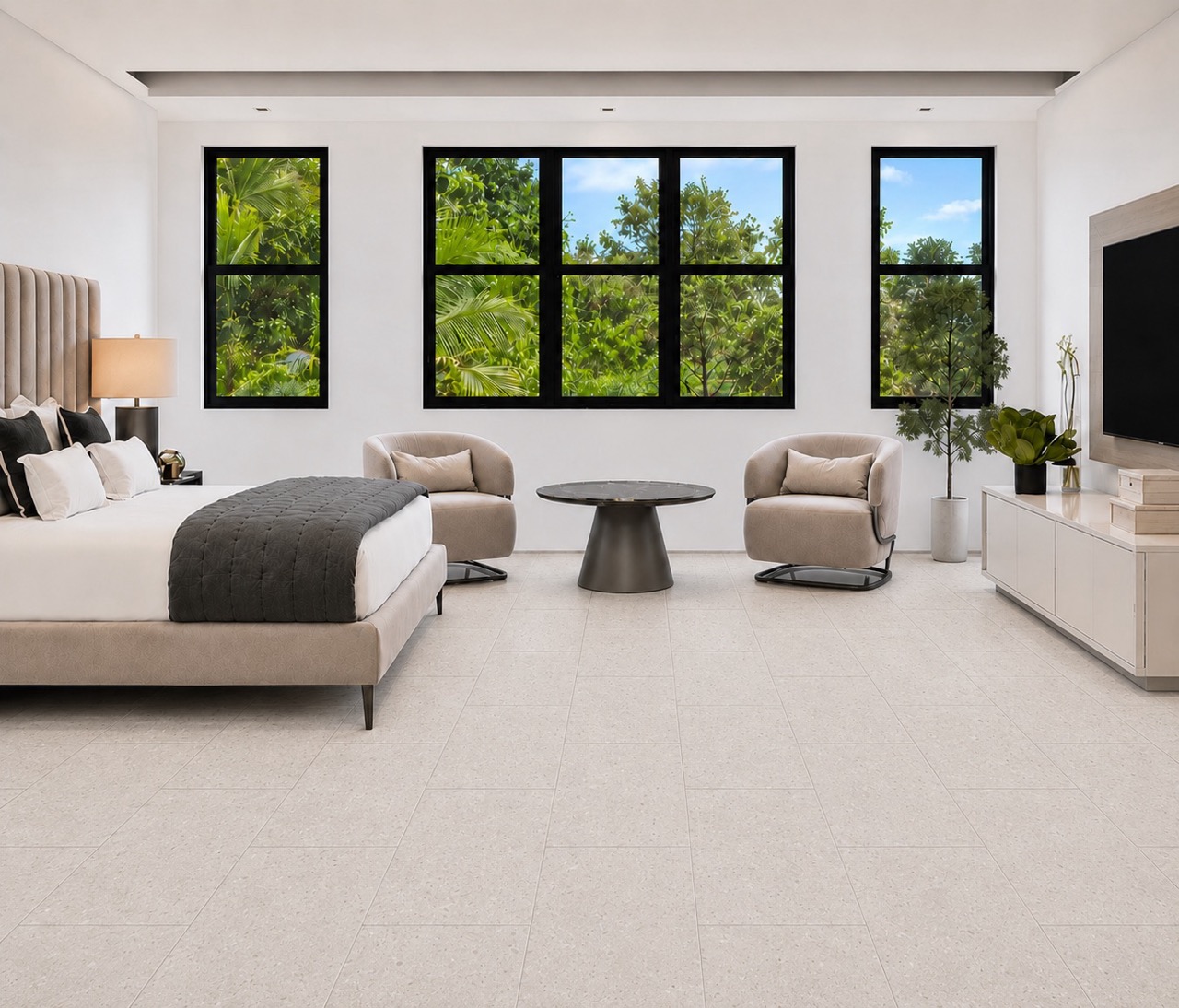 Matera Blend -19/64" (7.5mm) - Swiss Techslate (MMatBd7.5) Light limestone Matera Blend TechSlate flooring forms a subtle stone-look rectangular plank layout in a bedroom with upholstered bed and armchairs.