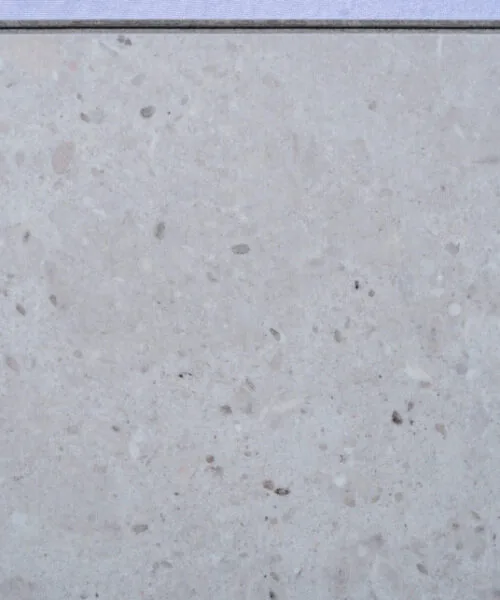 Matera Blend Swiss Techslate flooring with a light limestone stone appearance, featuring soft grey tones and subtle natural mineral detailing for modern residential and commercial spaces.