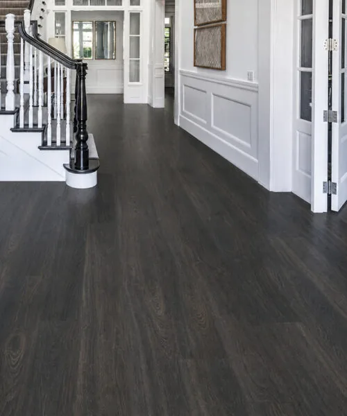 Mocha - 7/16" (11mm) - Swiss Design Cork Floating (FMoc11) Contemporary interior hallway with Mocha dark brown wood-grain floating cork planks.