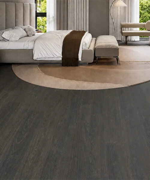 Mocha - 7/16" (11mm) - Swiss Design Cork Floating (FMoc11) Luxury neutral bedroom featuring Mocha wood-look cork flooring and a curved beige rug.