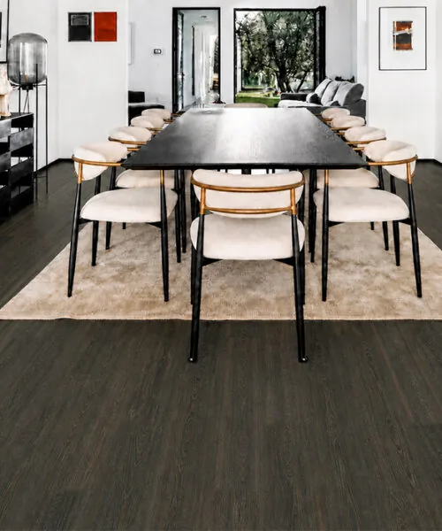 Mocha - 7/16" (11mm) - Swiss Design Cork Floating (FMoc11) Spacious modern dining room with Mocha wood-grain cork flooring and a black dining table.