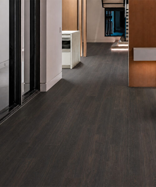 Contemporary interior hallway with Mocha dark brown wood-grain floating cork planks.