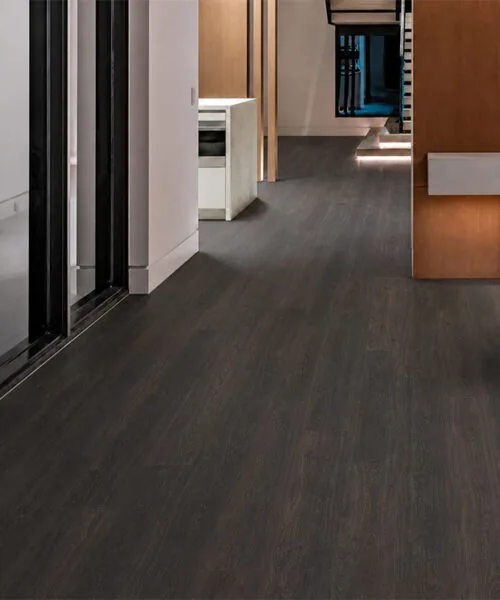 Contemporary interior hallway with Mocha dark brown wood-grain floating cork planks.