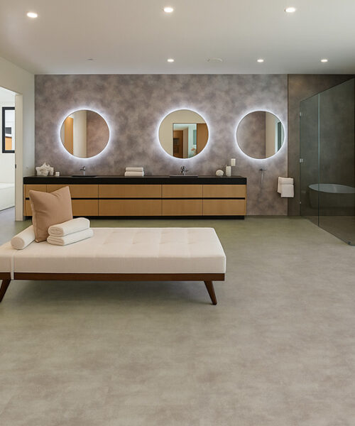 Spa-inspired bathroom with waterproof Copperstone Gray Swiss Linoleum flooring and modern décor.