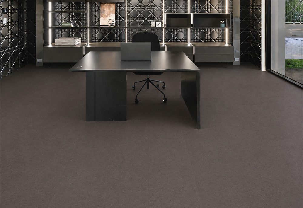 Night - 7/16" (11mm) - Swiss Real Cork Floating (FNig11) Dark Night cork flooring for an office creates a smooth plank layout beneath contemporary black furniture.